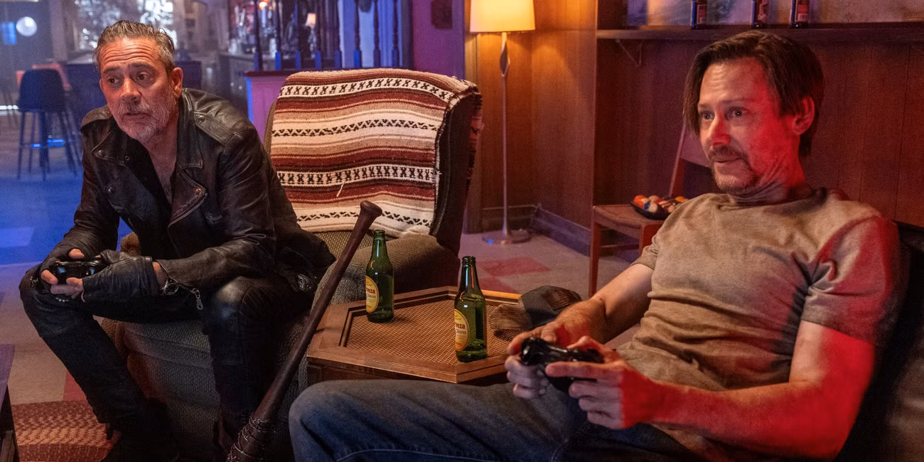 Jeffrey Dean Morgan as Negan playing video games with Jimmi Simpson as Dillard in The Walking Dead: Dead City