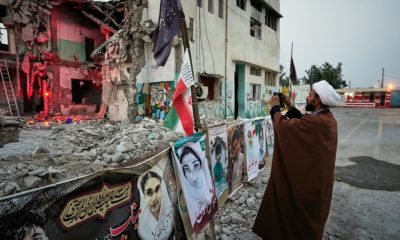 Iranian families grieve at a school where a US strike killed dozens