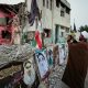 Iranian families grieve at a school where a US strike killed dozens