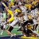 No. 16 Michigan escapes 'epic loss' thanks to disputed replay call