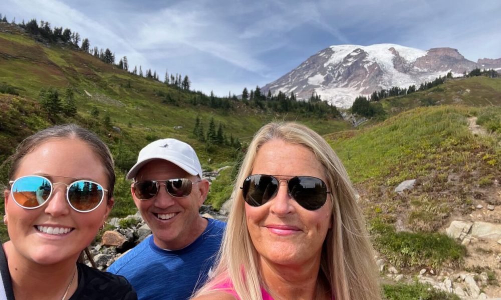 Deeanne King mountain background with her family 1260x945