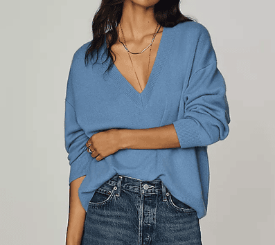 woman wears slouchy oversized cashmere sweater