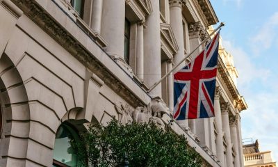 UK flag on a government building, symbolising regulatory authority and oversight