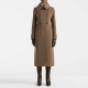 Brown double-breasted wool coat with an overlapped collar and a curved front hem that sweeps away from the button closure.