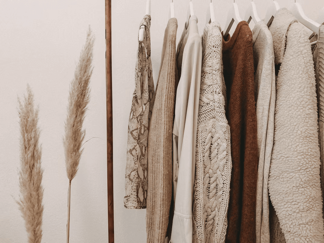 Rack of winter fashion clothes hanging on a