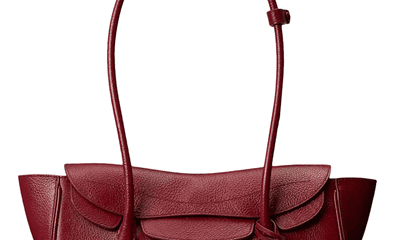 red leather handbag with long shoulder strap